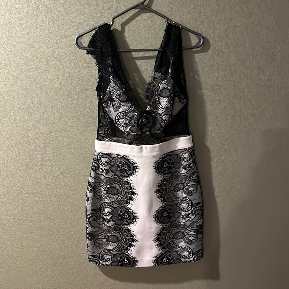 BEBE Knee length lady black and white dress